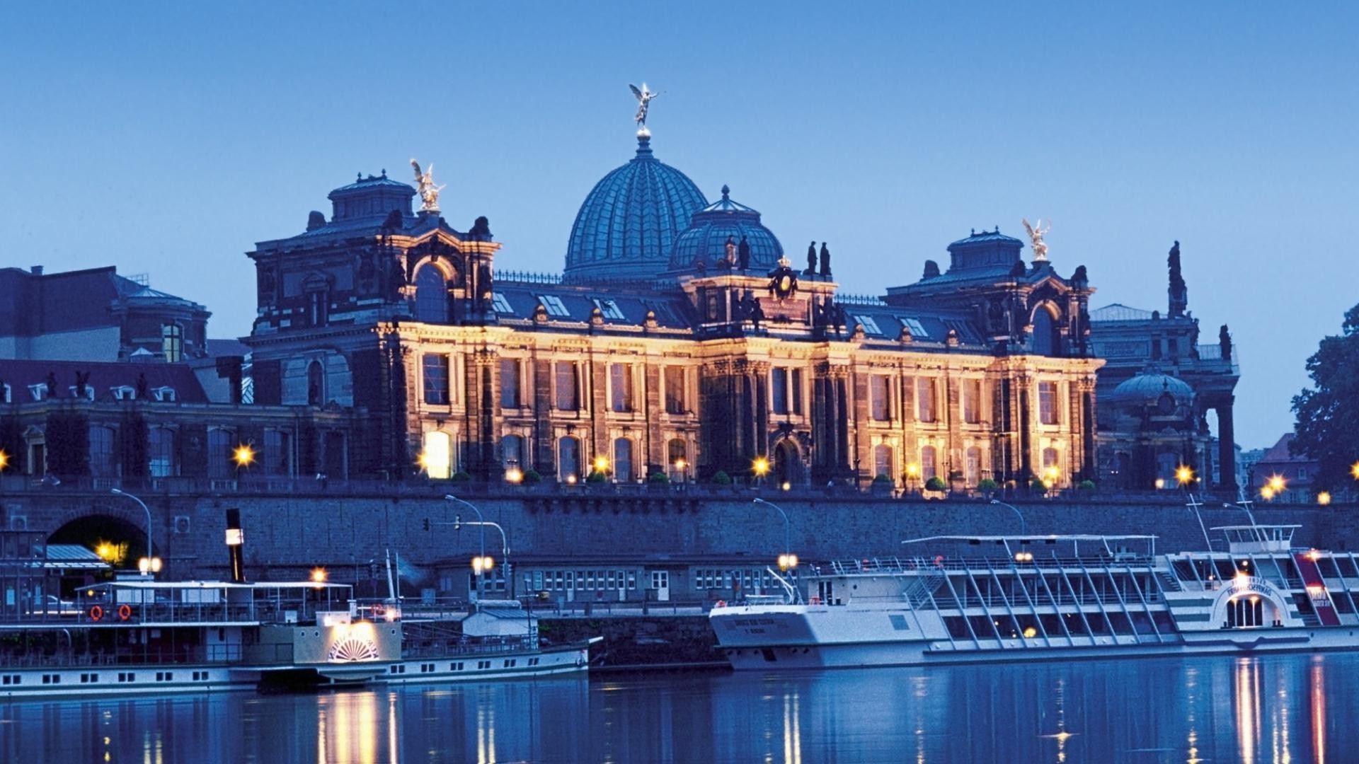 city architecture travel building sky dusk evening water river cityscape outdoors landmark urban tourism skyline sight reflection bridge cathedral