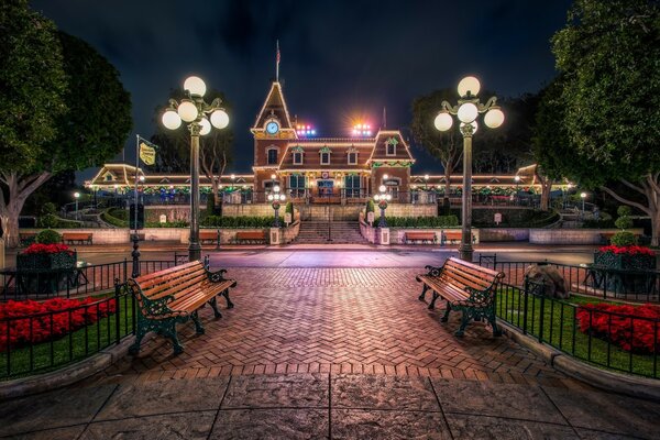 A park with a pretty house in the center