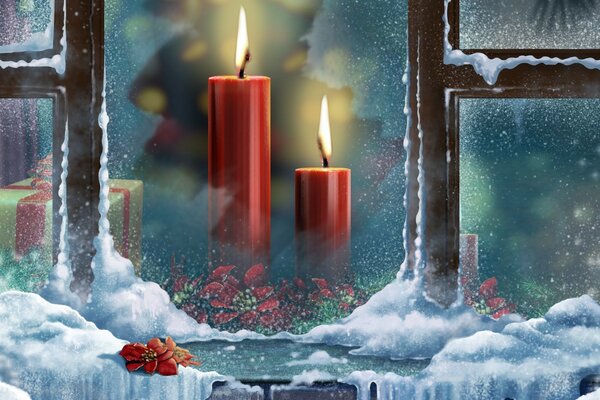 Candele di Natale accese nella finestra