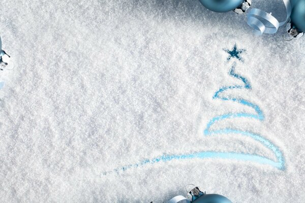 A Christmas tree painted on white snow