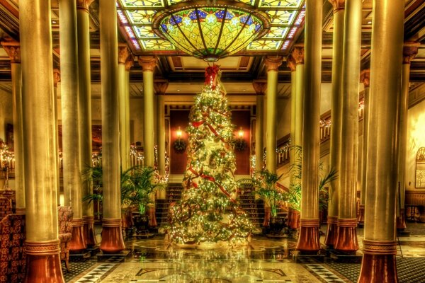 Decorated Christmas tree in a beautiful building