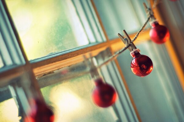 Balls for decoration hang on the window