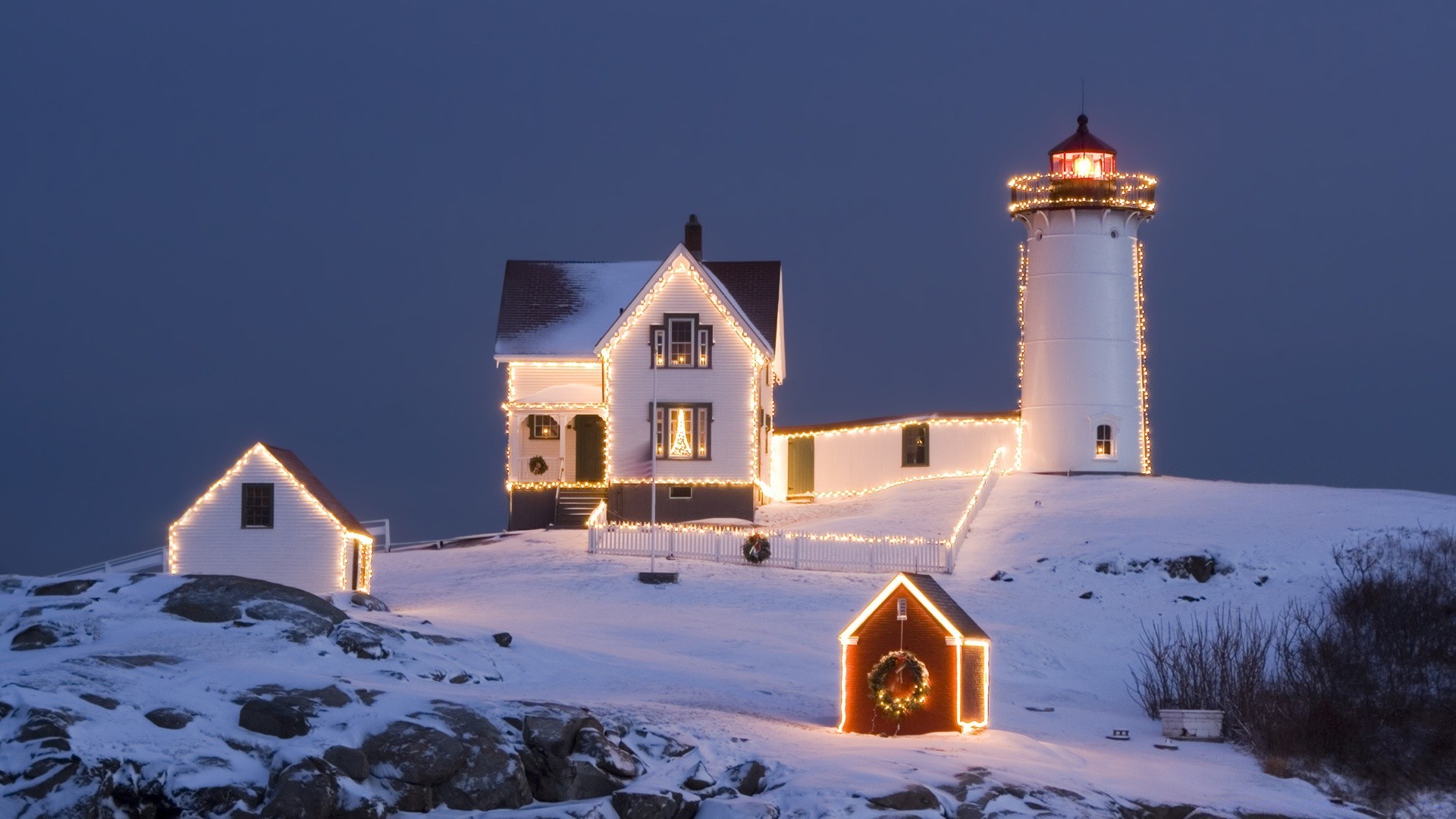 christmas architecture house building winter snow outdoors travel sky daylight landscape light home evening scenic lighthouse seashore church