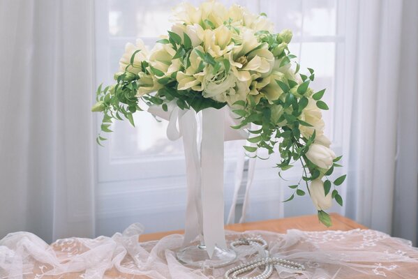 Indoors, a bouquet of flowers in a vase