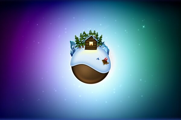 Boule de Noël avec la maison sur le bureau