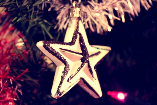 Christmas tree decorations. Star, tinsel, Christmas lights