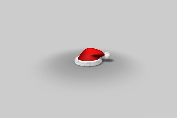 Christmas Santa Claus hat on gray background