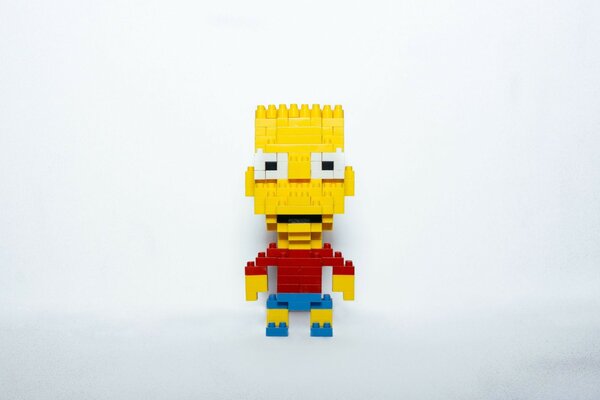 Some kind of yellow dude in a red lego jacket