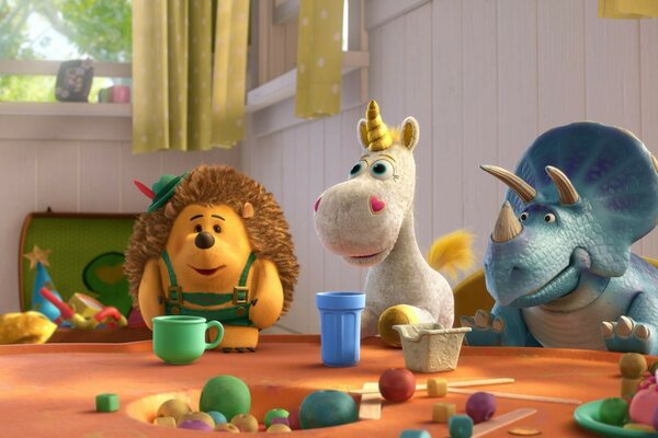 A picture from the cartoon toy story 3 with a hedgehog and a unicorn