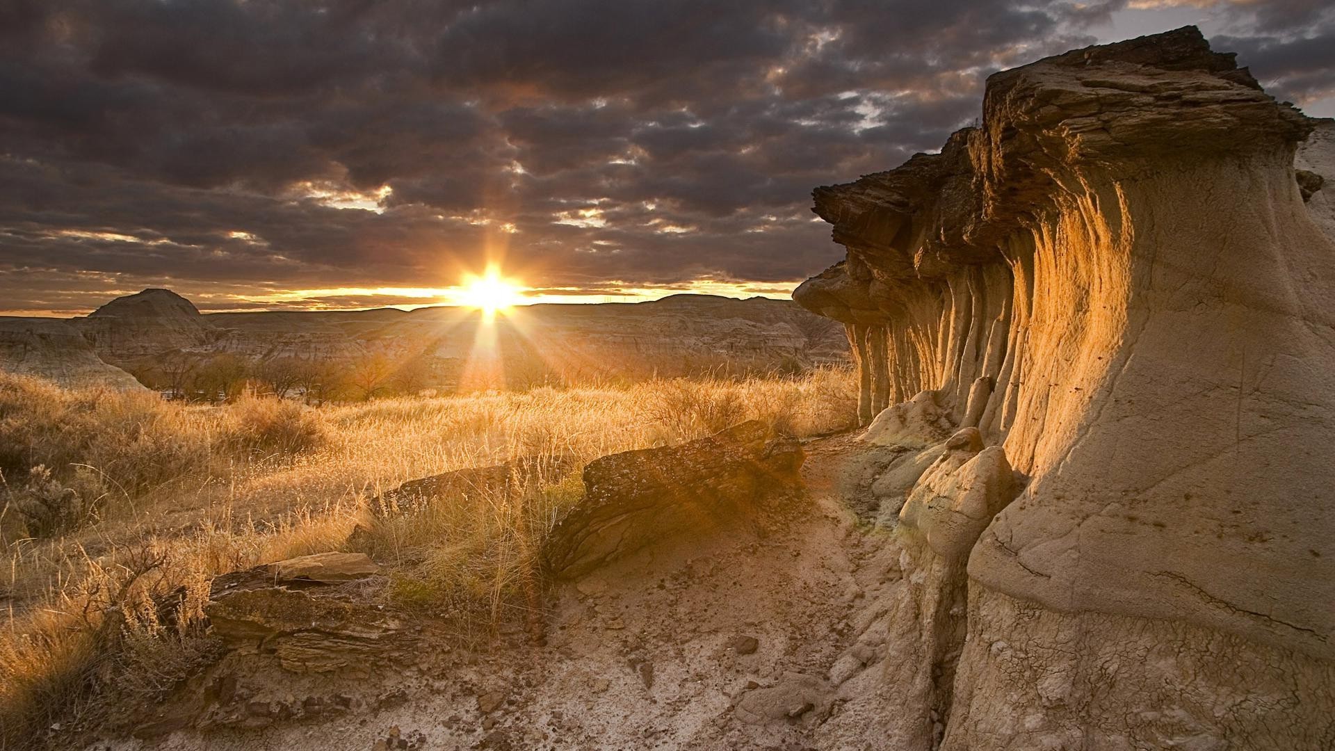 the sunset and sunrise sunset dawn landscape sky travel outdoors nature desert water dusk evening sun rock