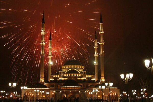 Night fireworks over a beautiful city with architecture