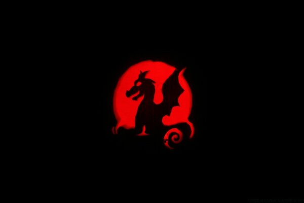 Black dragon on red background