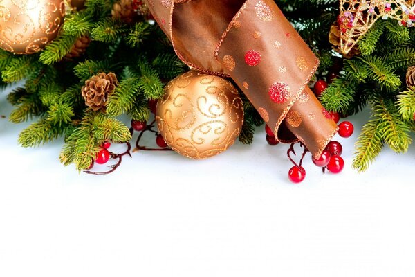 Decoration of a fir branch with ribbons and balls