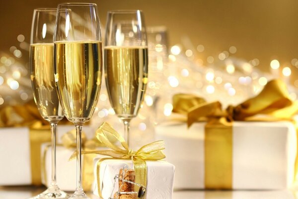 Champagne and New Year s Gifts on the table