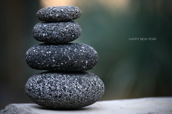 A stack of stones. Balance. Neutral background