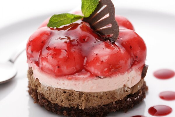 Juicy dessert with berries and chocolate sponge cake