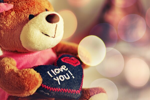 Traditional teddy bear with a heart on Valentine s Day