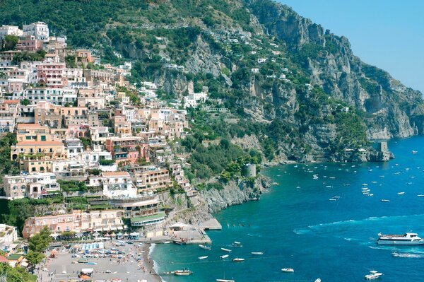 A city winding through the mountains by the sea