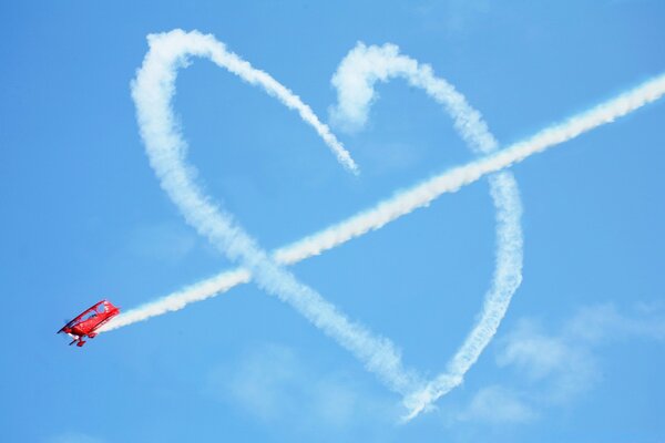 القلب في السماء طائرة دخان عيد الحب