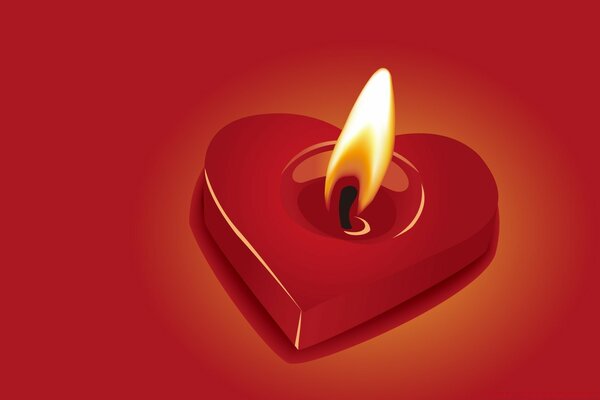 A lit candle in the form of a red heart