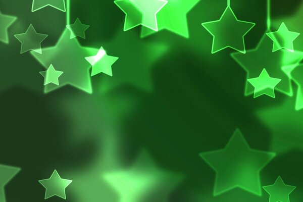 Étoiles vertes au néon avec flou