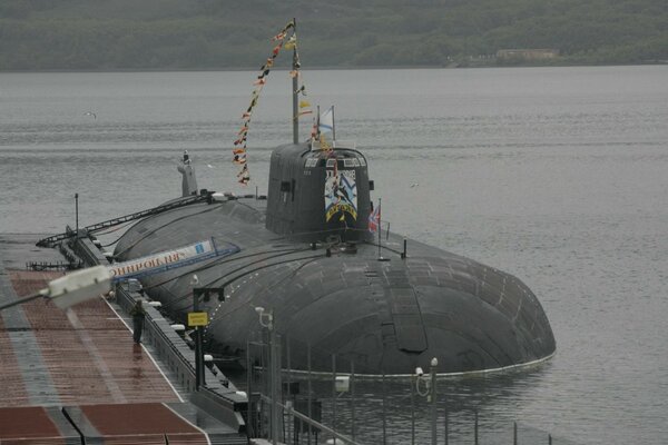 The submarine moored to the shore