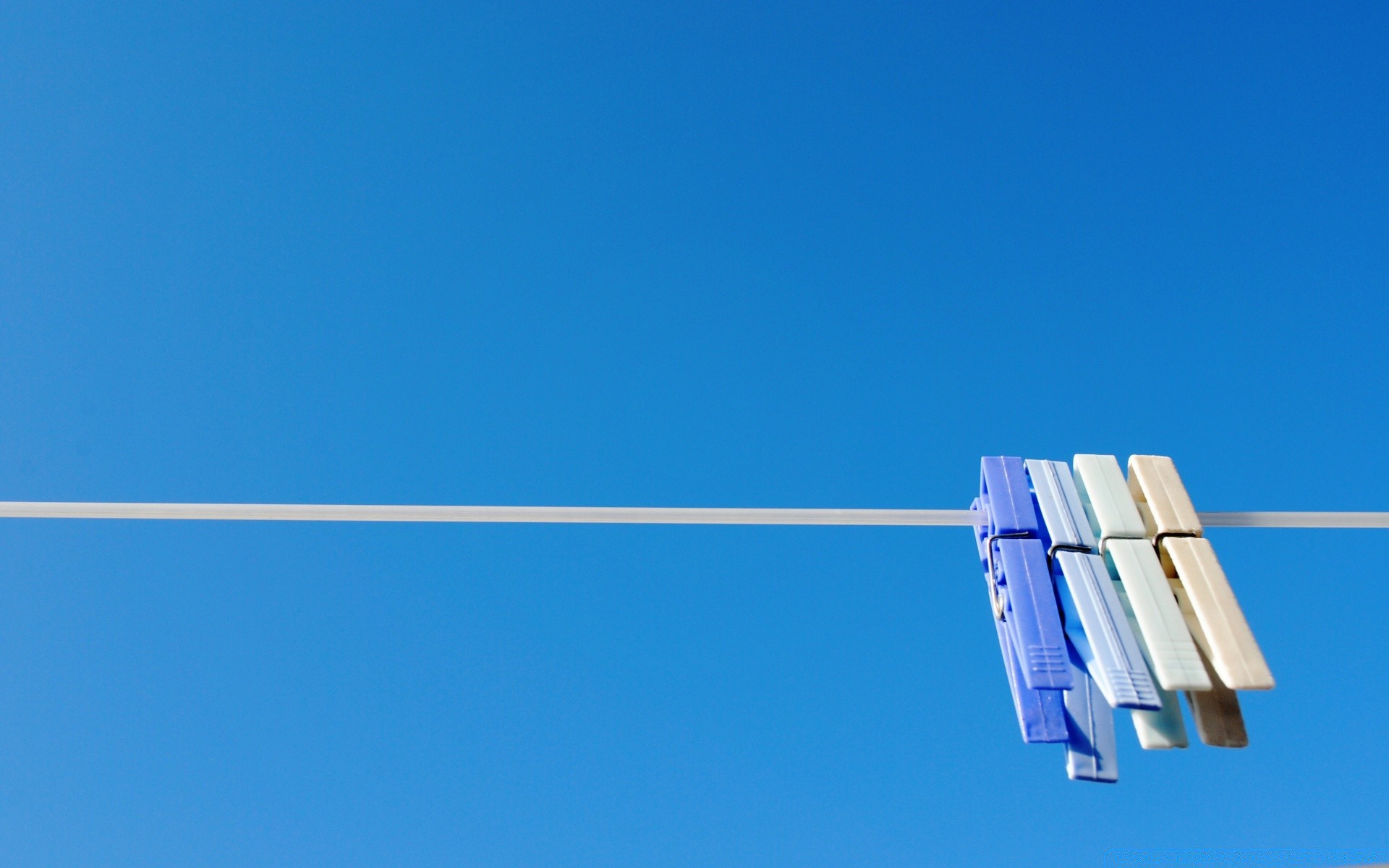 macro sky clothesline rope clothespin laundry outdoors family