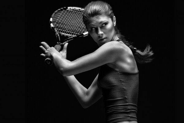 Portrait of a tennis player before the stroke