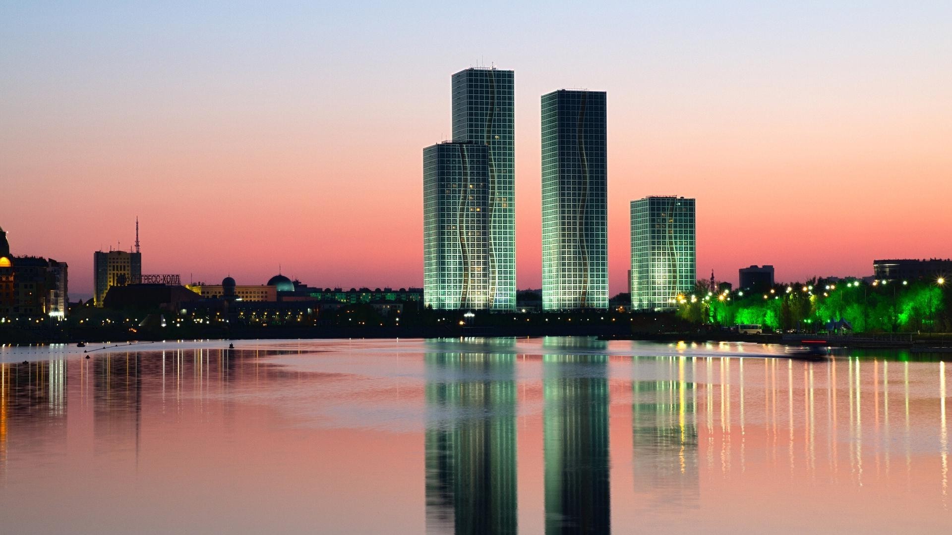 skyscrapers architecture city reflection downtown skyline cityscape river sky dusk skyscraper modern water building waterfront sunset urban office business travel