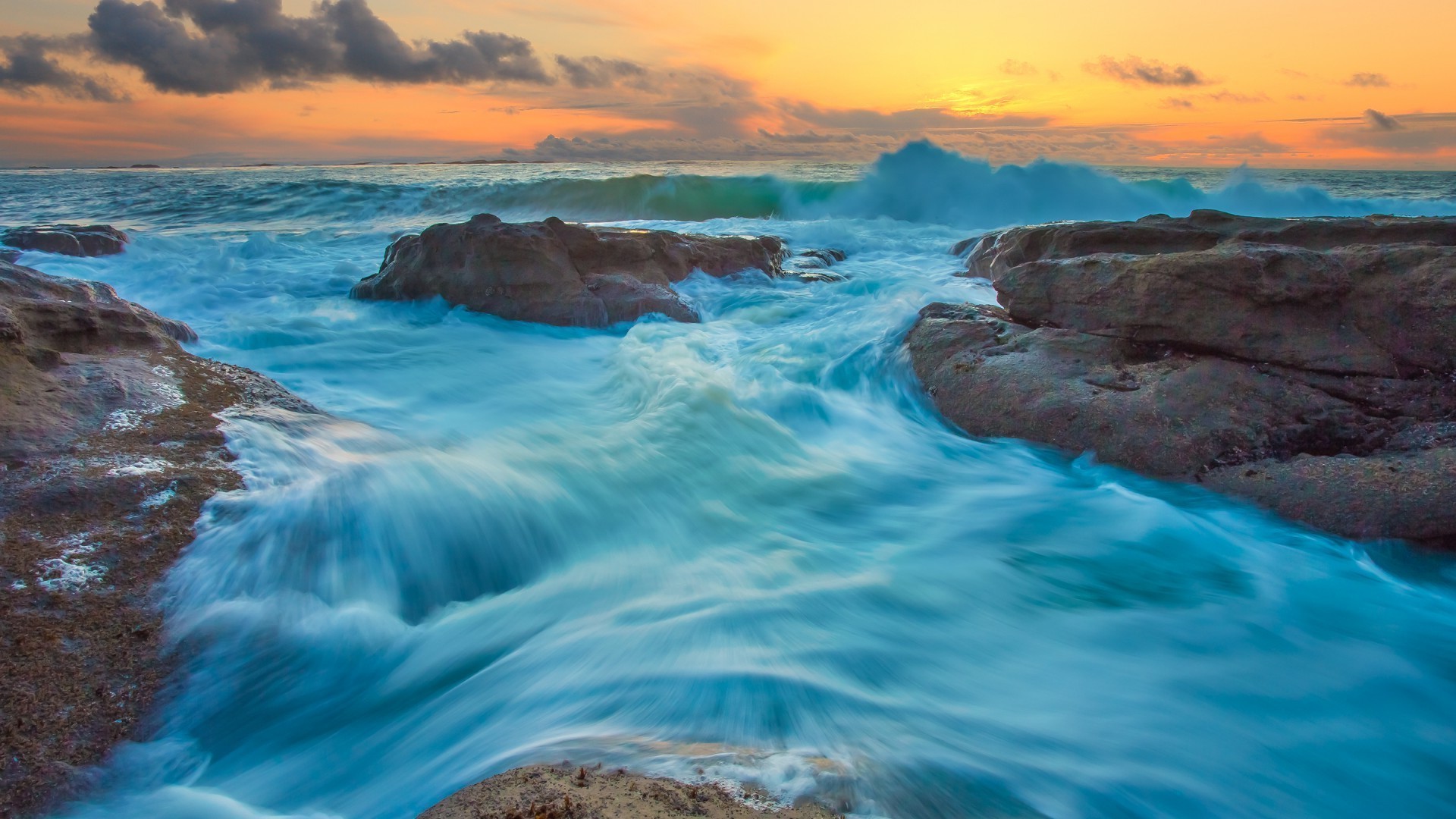 sea and ocean water sea ocean sunset travel seashore surf beach seascape landscape dawn rock nature evening wave scenic sky dusk