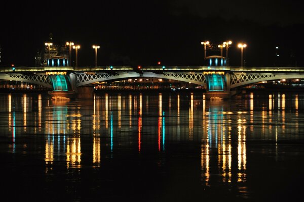 Illuminated bridge, beautiful city, big river, nice to travel