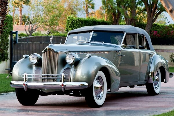 A very beautiful retro car on the road