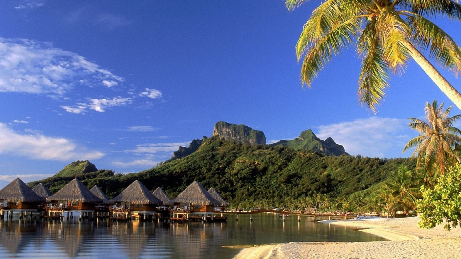 paisagens água viagens tropical idílio verão exóticas praia férias natureza céu cabana ilha ao ar livre mar relaxamento árvore areia férias resort