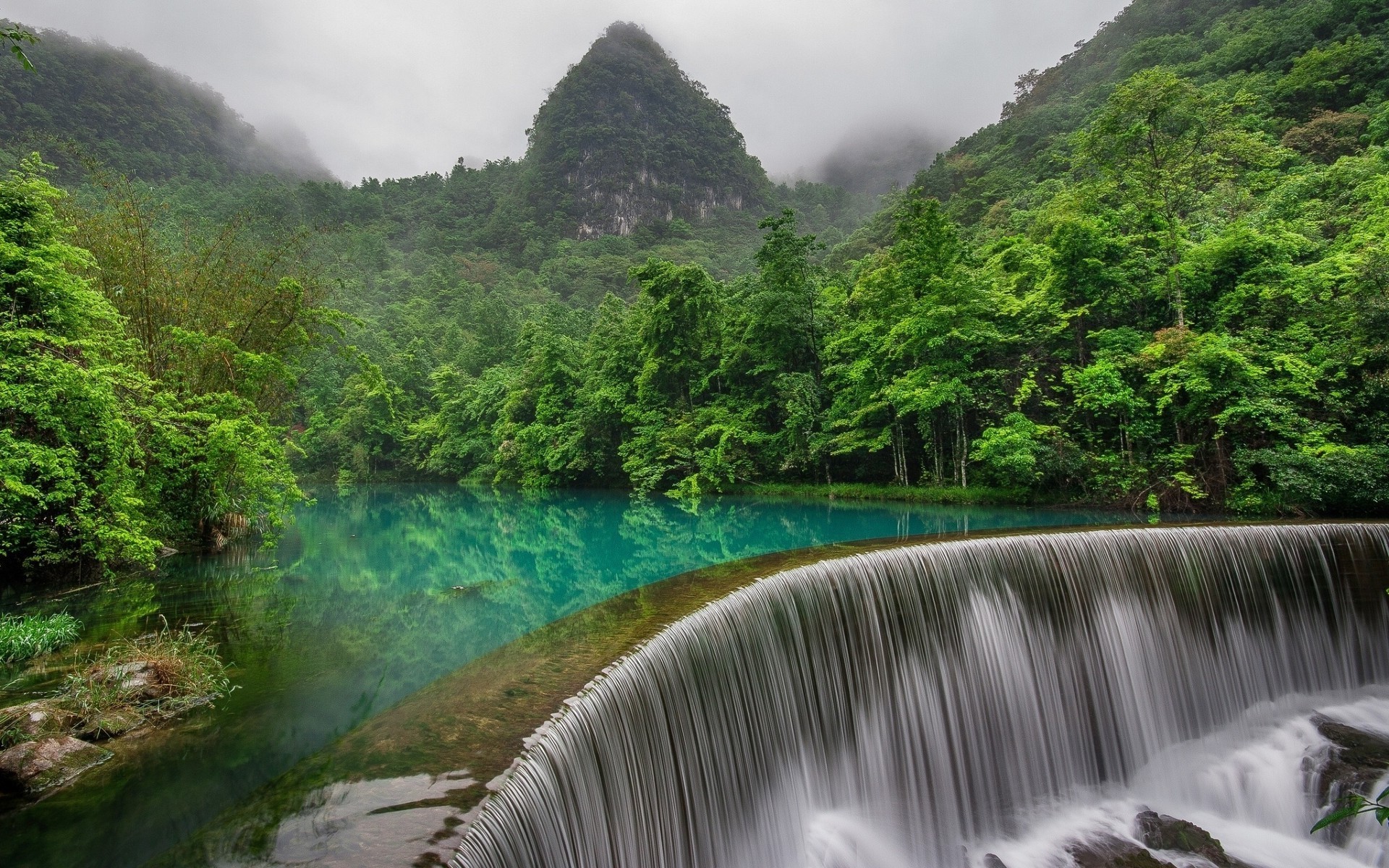 paesaggio acqua cascata fiume paesaggio natura legno viaggi flusso montagna foresta pluviale flusso roccia all aperto albero cascata tropicale estate giungla scenico