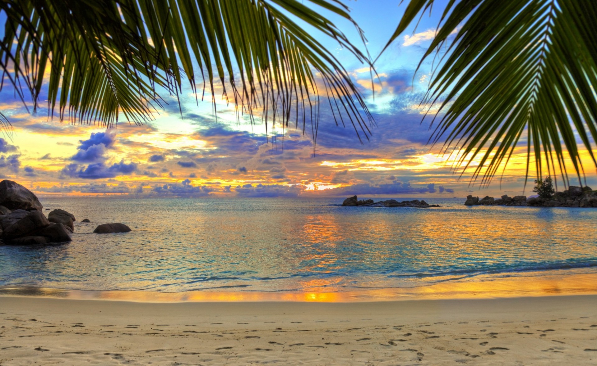 tramonto e alba tropicale spiaggia acqua sole oceano sabbia viaggi estate tramonto mare vacanza mare isola relax paradiso esotico paesaggio onda resort palme