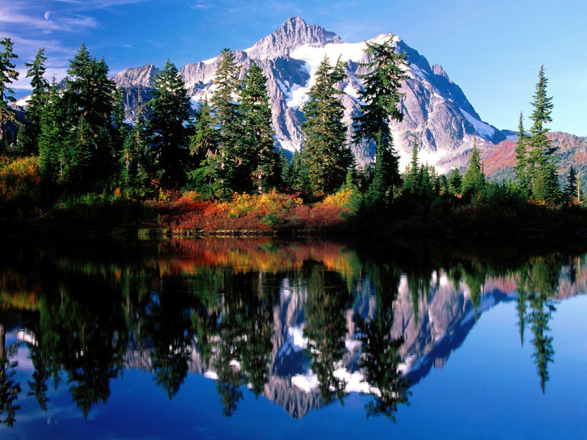 berühmte orte reflexion wasser see berge schnee natur holz landschaftlich reisen landschaft im freien baum himmel