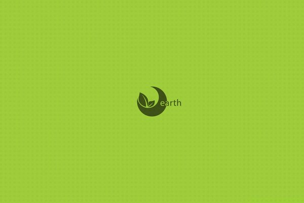 Monotonous green wallpaper on the desktop with an emblem