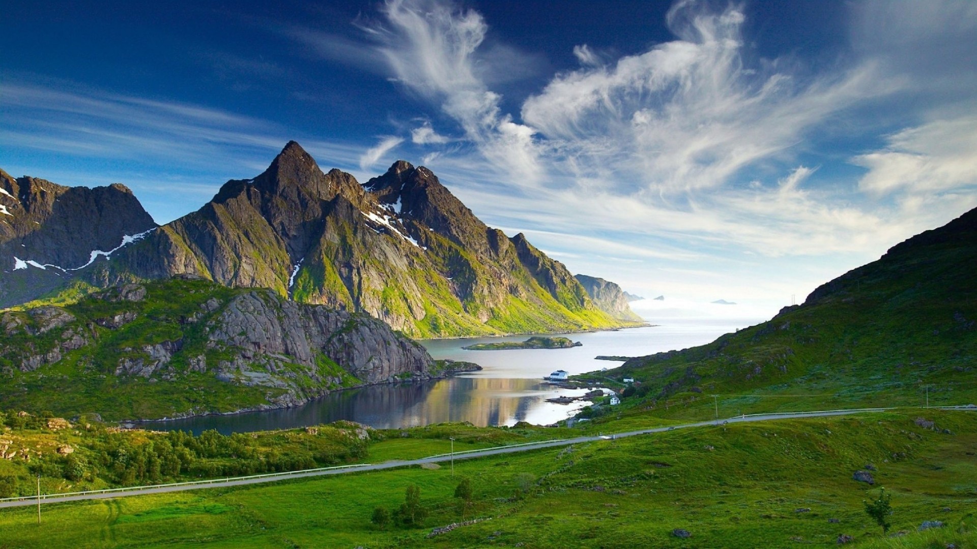 mountains mountain landscape travel water nature sky outdoors lake valley snow grass scenic summer rock