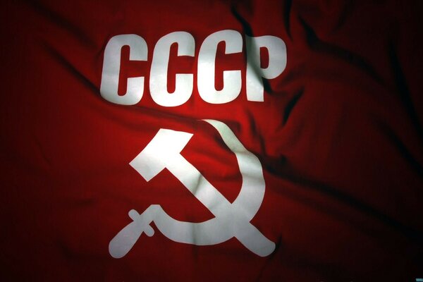 The flag of the most powerful country in the world , the USSR