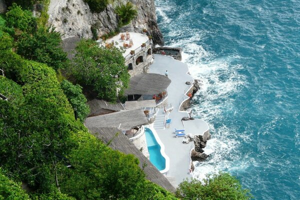 Swimming pool on the rocky ocean shore