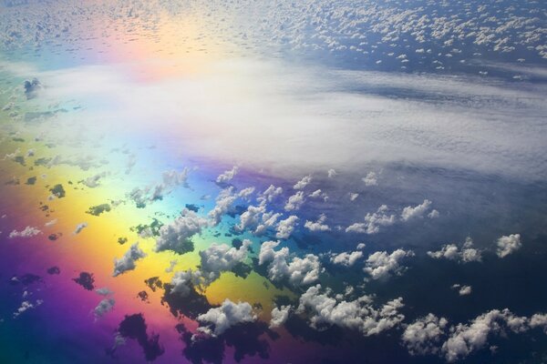 Rainbow in the air above the clouds