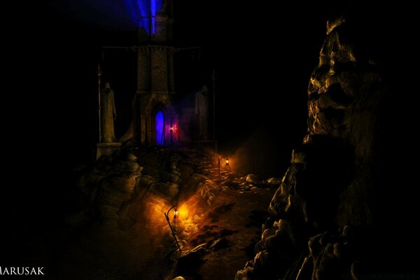 A dark street with small lanterns