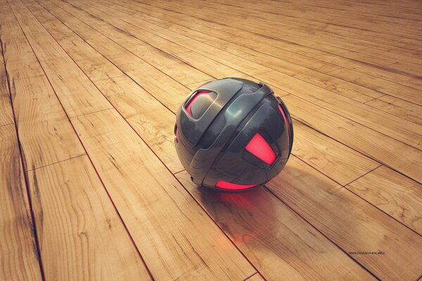 A glowing ball on a wooden floor