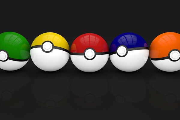 Cinq boules pokemon multicolores