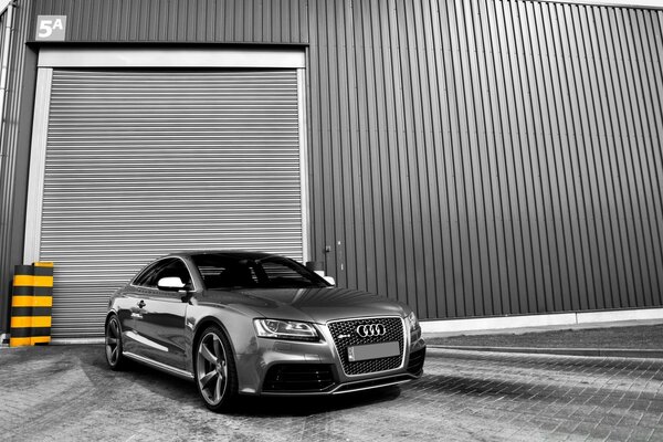 Gray Audi is parked in the parking lot beautiful art