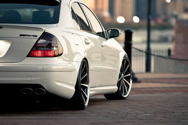 White Mercedes AMG with beautiful wheels