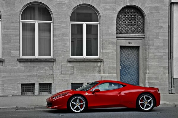 Contrasting image of a red car