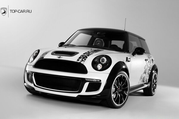 Photo of a minicooper sports car in black and white