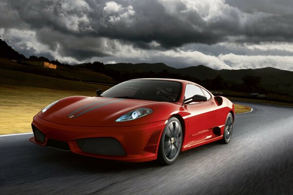 Racing car on the background of hills and gray clouds