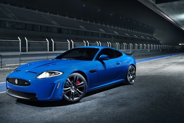 Blue sports car on the road